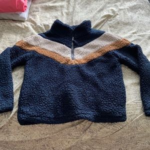 Navy, white, and tan teddy pullover jacket